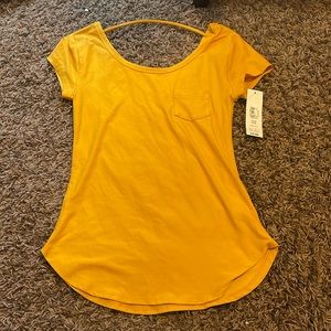 i am selling a yellow short sleeve top! this was a gift to me.